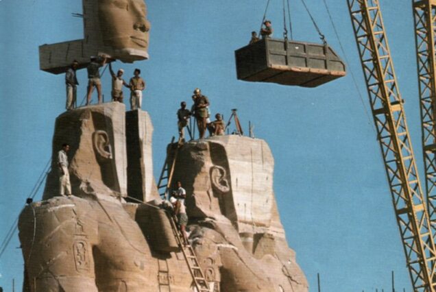 The relocation of the Abu Simbel temples in Egypt during the 1960s, showing the dismantling and reconstruction process.