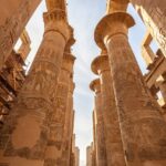The Great Hypostyle Hall in the Karnak Temple Complex, Luxor, Egypt, with massive columns and hieroglyphic carvings.