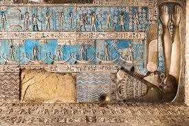 Intricate ceiling and wall decorations inside the Temple of Hathor at Dendera, Egypt.